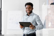 © Syda Productions - business, people and technology concept - african american businessman with tablet pc computer at office