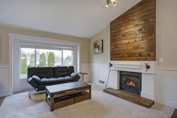 Beautiful bright living room interior with fireplace.