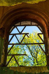 Wall Mural - Wall of a ruined building with an empty window - a retro pattern