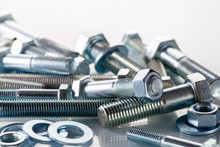 Screws, Nut And Bolts On White Background.