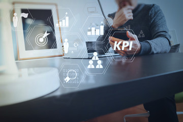 Poster - businessman working with smart phone and digital tablet and laptop computer in modern office