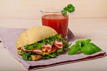 Sandwich with tomato juice