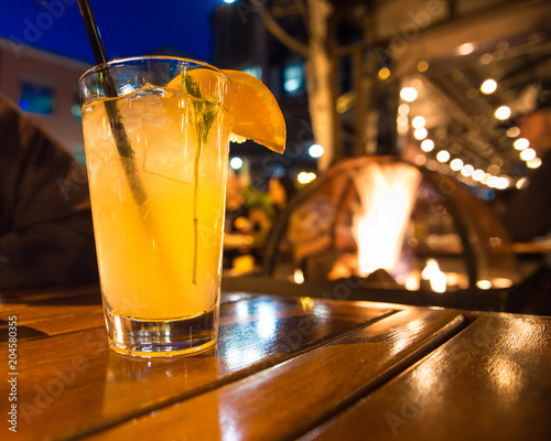 Refreshing Cocktail Beverage With Ice And Straw Scene From Outdoor