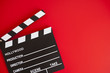 film clapper on red background