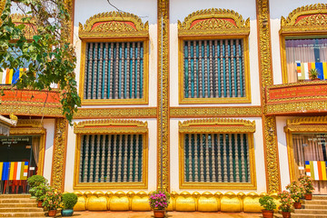 Wall Mural - Wat Preah Prom Rath beautiful temple gold windows in Siem Reap, Cambodia