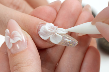 Amazing 3d Flower nail art design on tinted glass nails.