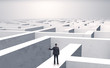© ra2 studio - Small businessman in a middle of a huge maze