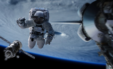 Wall Mural - astronaut working on a space station 3d rendering elements of this image furnished by nasa