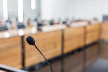 Microphone over the blurred business forum Meeting or Conference Training Learning Coaching Room Concept, Blurred background