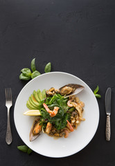 Wall Mural - Warm salad with grilled seafood flat lay