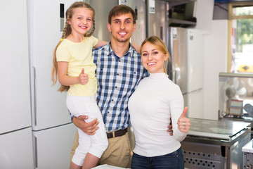 family selecting refrigerator