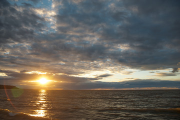 Wall Mural - sunset over the evening ocean