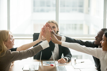 Poster - Excited happy multiracial business team giving high five at office meeting motivated by victory, unity, good relations or great result, celebrating success together, promising engagement and loyalty