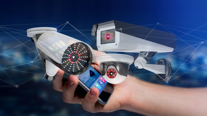 Poster - Businessman using a smartphone with a Security camera system and network connection - 3d rendering