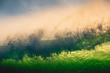 Crashing Wave Crest In Ocean. Breaking Green Wave And Sun Light In Bali
