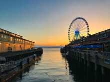 Boardwalk Waterfront Seattle Washington With Ferris Wheel Sunset Puget Sound