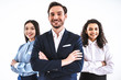 The three business people standing on the white background