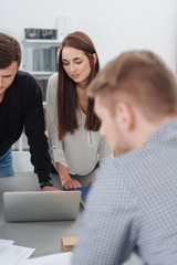 Poster - Group of young people in an office brainstorming