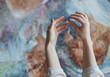 © AboutLife - Women's hands with a mosaic