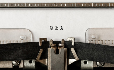 Aufkleber - Text Q and A typed on retro typewriter