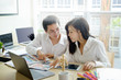 © bongkarn - team of designers in the workplace.