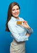 © Yuriy Shevtsov - Smiling businesswoman showing bank credit card.
