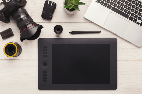 Designer workplace with graphic tablet and laptop