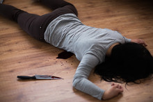 Murder, Kill And People Concept - Dead Woman Body And Knife In Blood Lying On Floor At Crime Scene (staged Photo)