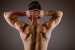 © Antonio Ovejero Diaz/ADDICTIVE STOCK - Man muscular back on dark background