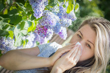 Young Woman Suffering From Pollen Allergy, Allergy Season, Girl Blowing Her Nose