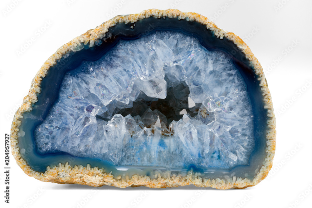 Geode with crystals of light-blue color. Cross section of natural stone. - obrazy, fototapety, plakaty 