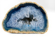 Geode with crystals of light-blue color. Cross section of natural stone.