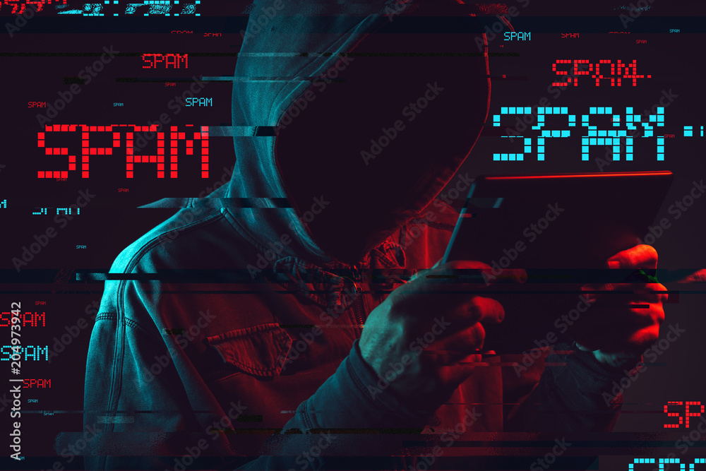 Electronic spamming concept with faceless hooded male person - obrazy, fototapety, plakaty 