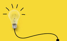 Creative Thinking Ideas Brain Innovation Concept. Light Bulb On Yellow Background