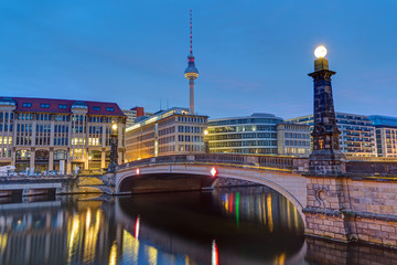 Wall Mural - Historic bridge over the river Spree in Berlin at dawn with the Television Tower in the back