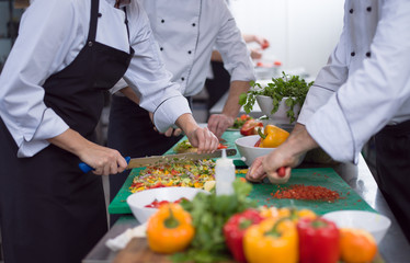 team cooks and chefs preparing meals