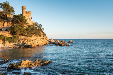 Fototapete - Landscape of Lloret de Mar Castle and its beach in a sunny afternoon, Spain.