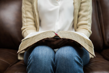 Wall Mural - woman holding bible