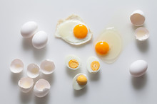 Set Of Fried Boiled Raw Eggs On A White.
