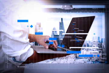 Poster - businessman working on his laptop in office with london city background