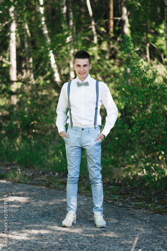 blue pants white shirt tie