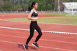 © i am way - Asian woman runner in track