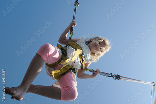 Blondes Madchen Beim Bungee Trampolin Springen Buy This Stock Photo And Explore Similar Images At Adobe Stock Adobe Stock