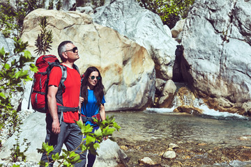 Wall Mural - Traveling is a tourist route with a backpack.