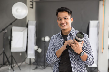 young man photographer smiling