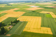 Bird eye view of land farmland and nature landscape. Aerial photography of agriculture fields in countryside.