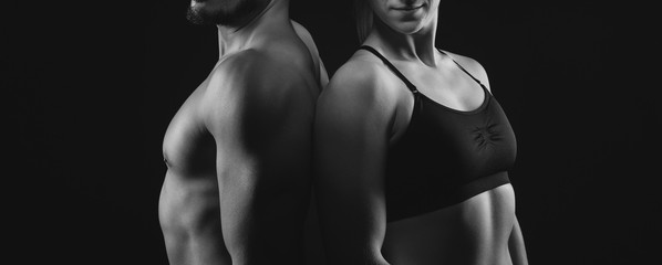 Fitness workout couple with perfect upper bodies