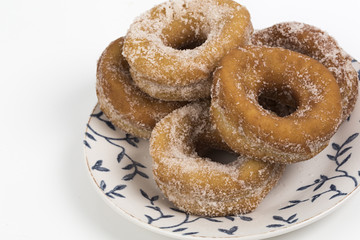 Wall Mural - Rosquillas caseras en plato decorado.