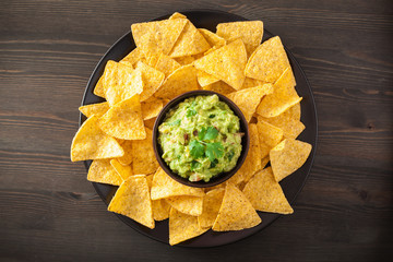 mexican guacamole dip and nachos tortilla chips