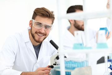 Wall Mural - closeup. a scientist in a modern laboratory